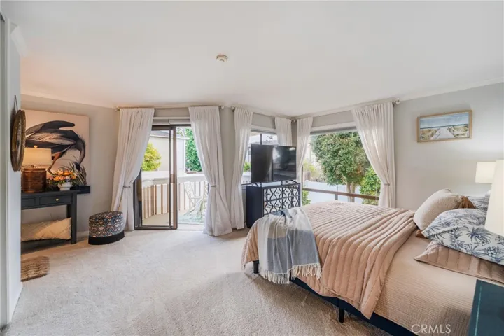View of the main bedroom to the private deck