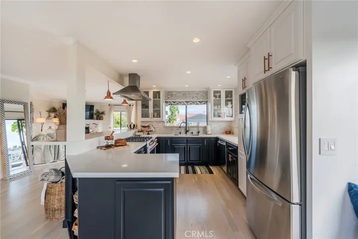 View from the dining corner through the kitchen bar top