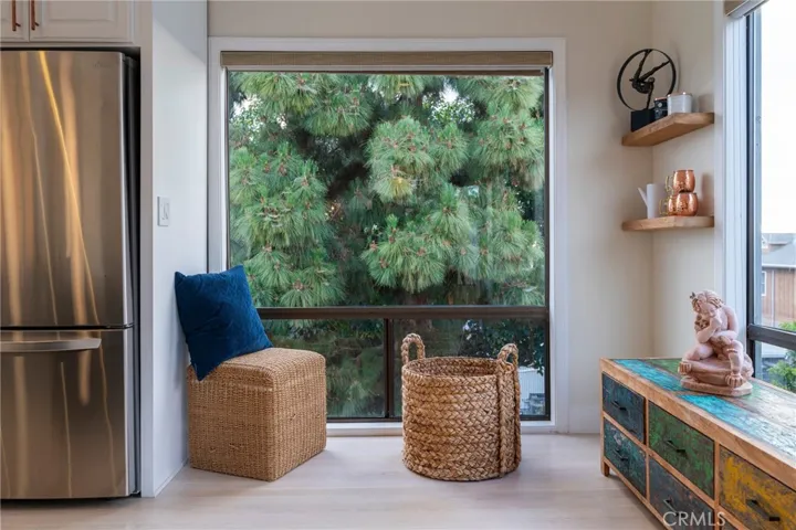 Floor to ceiling windows that have sliding windows at the base offer fantastic cross ventilation