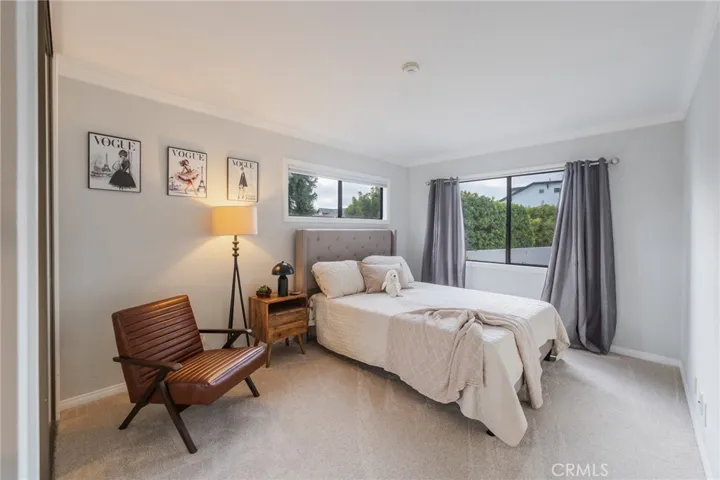 2nd bedroom with natural light from two windows that will bring in a cross breeze