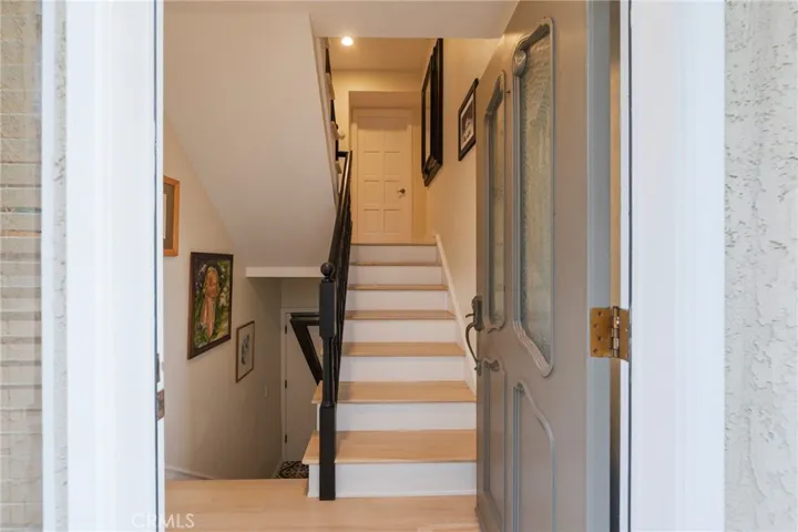 Welcome home. Upstairs to the bedrooms floor and then up again to the living area. Downstairs to the laundry, garage and work room.