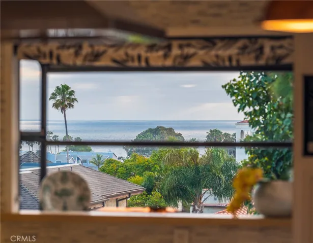 A close up view of the ocean from the kitchen bay window