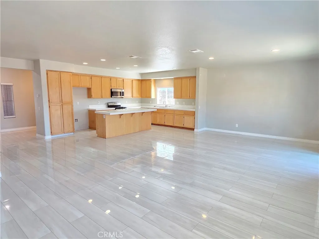 View of Kitchen, Dining Room and front entrance