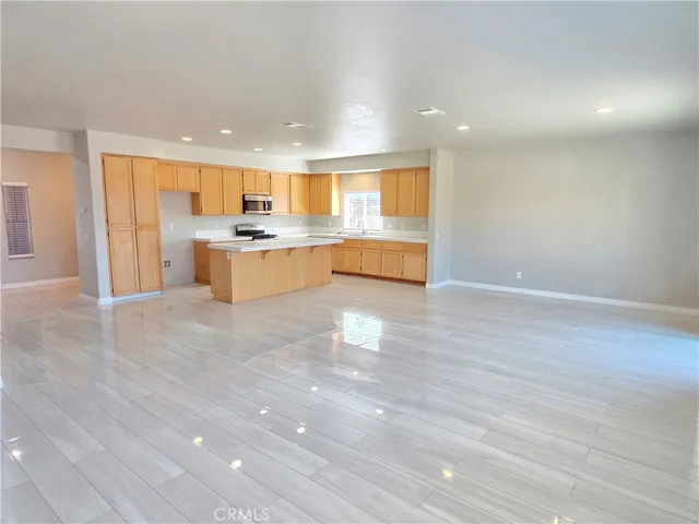 View of Kitchen, Dining Room and front entrance