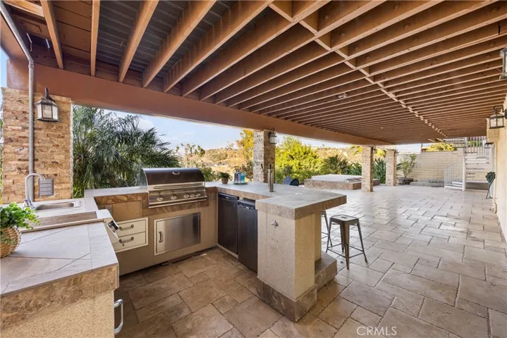 Downstairs outdoor kitchen and bar