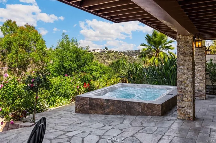 Enjoy views from oversized spa (Shown Virtually in Operation)
