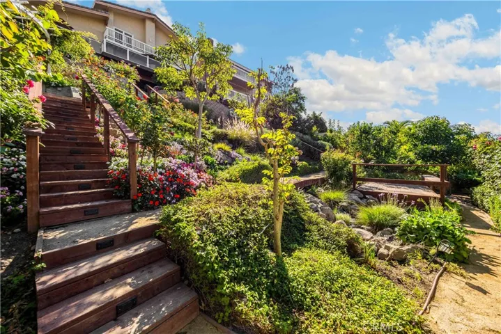 Lush landscaping and flowers at every turn