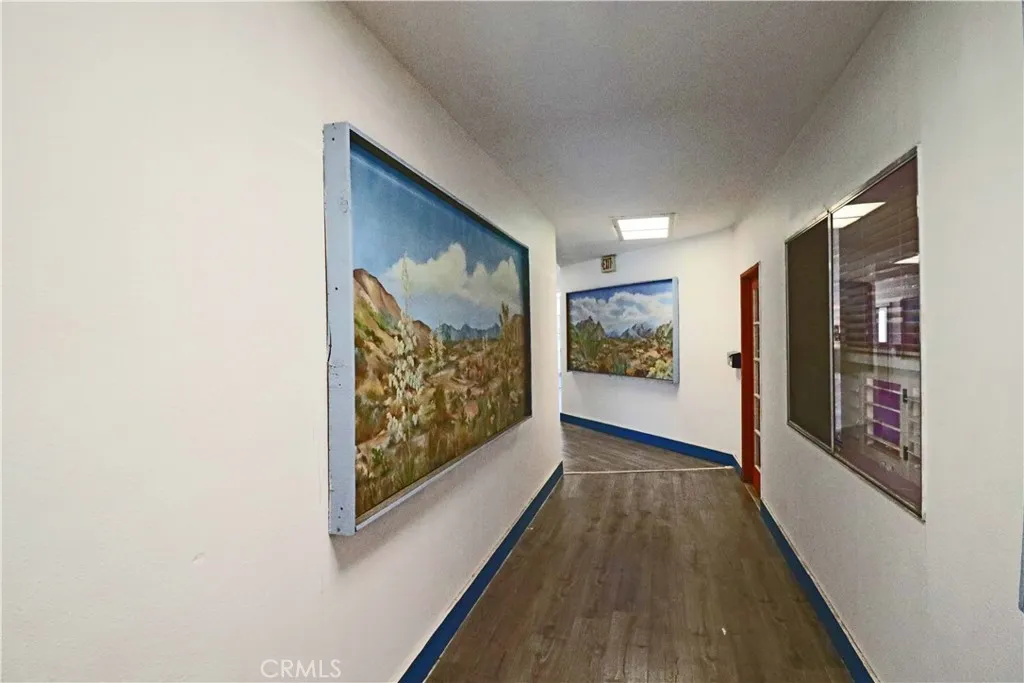Hallway leading to front door.