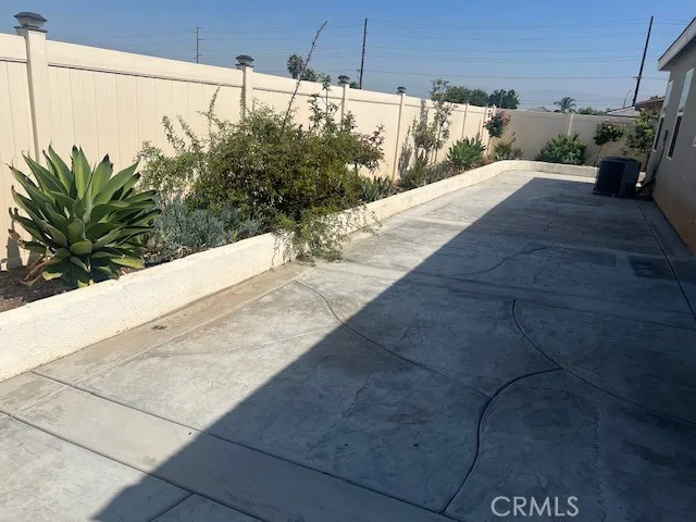 BACKYARD WITH CONCRETE HARDSCAPE BACKYARD WITH CONCRETE HARDSCAPE