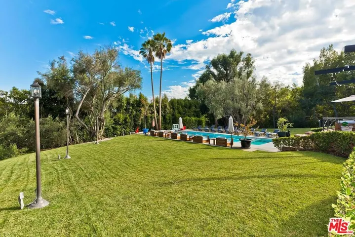 Grounds with Pool and Treetop