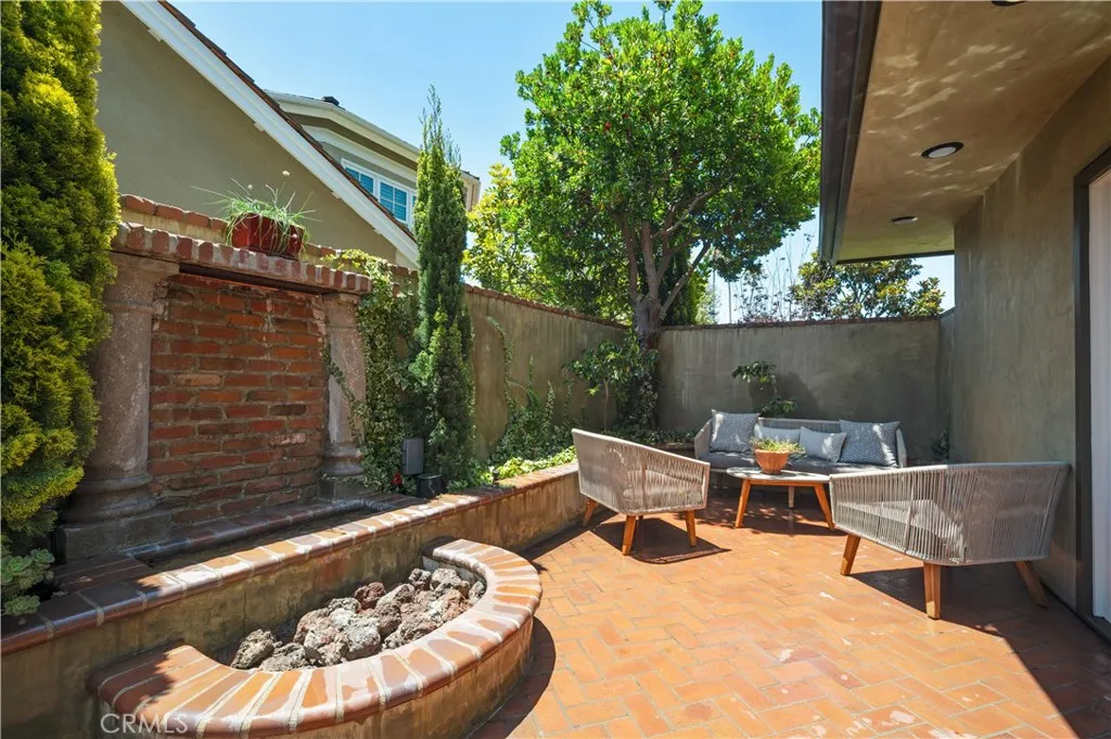 The back patio features a wonderful waterwall slash fountain. This is powerful from a feng shui stand point.