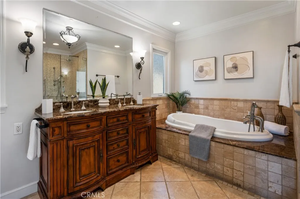 Step into your own personal spa in this very well appointed primary bed and bath.