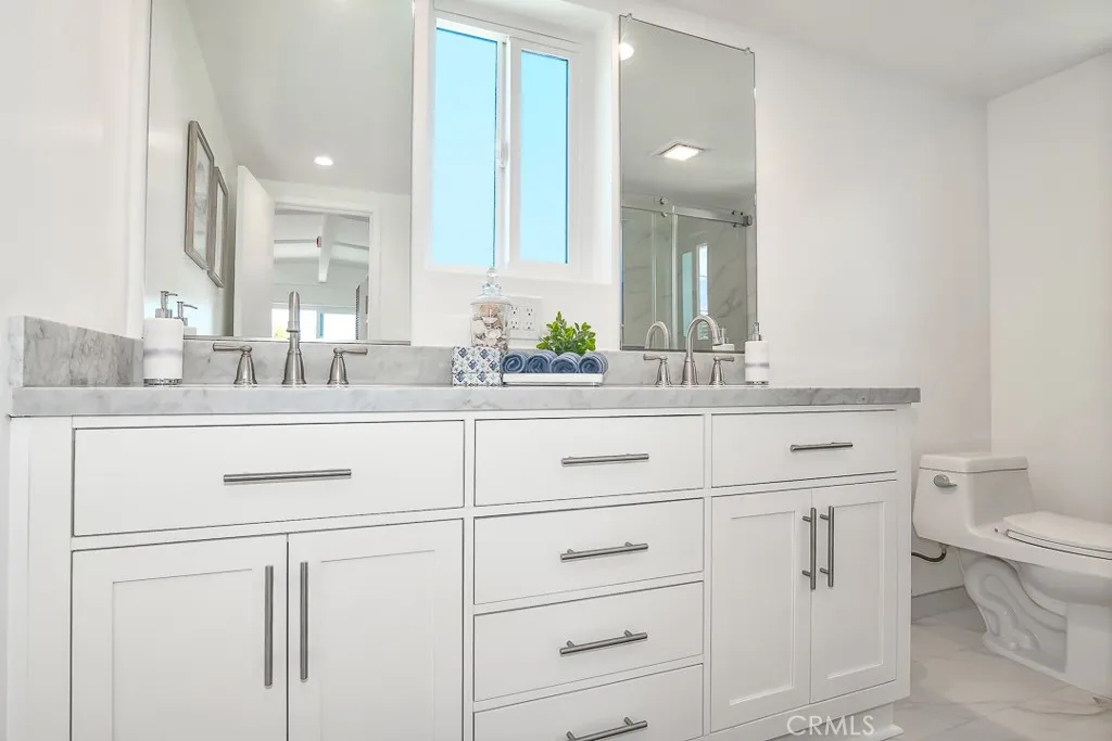Upstairs primary en-suite, double sinks