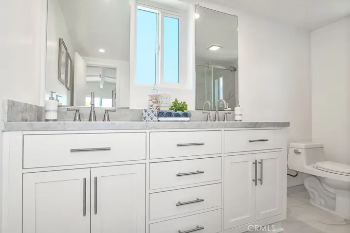 Upstairs primary en-suite, double sinks