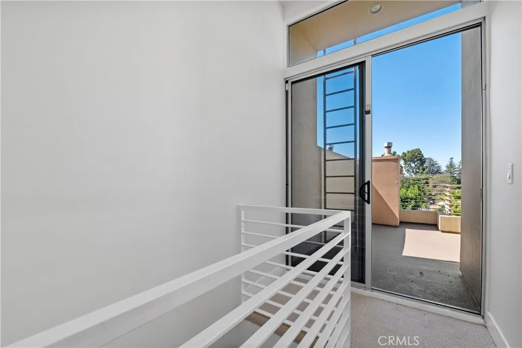 Top of staircase to rooftop deck entrance