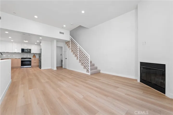 Living area with decorative fireplace