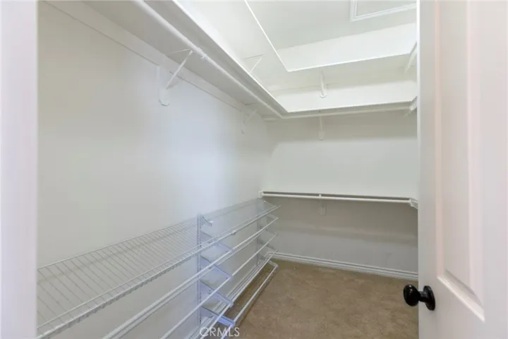 Master closet with built-in shoe racks