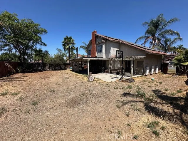 Rear yard and 3 tesla power wall batteries