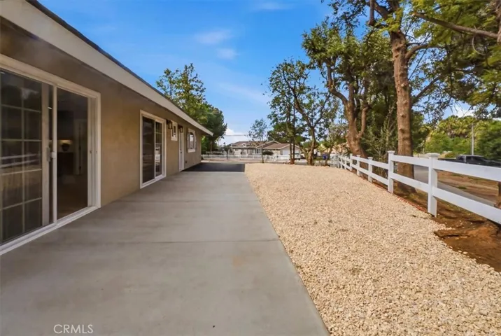 SIDE PATIO ADJACENT TO GOLF COURSE