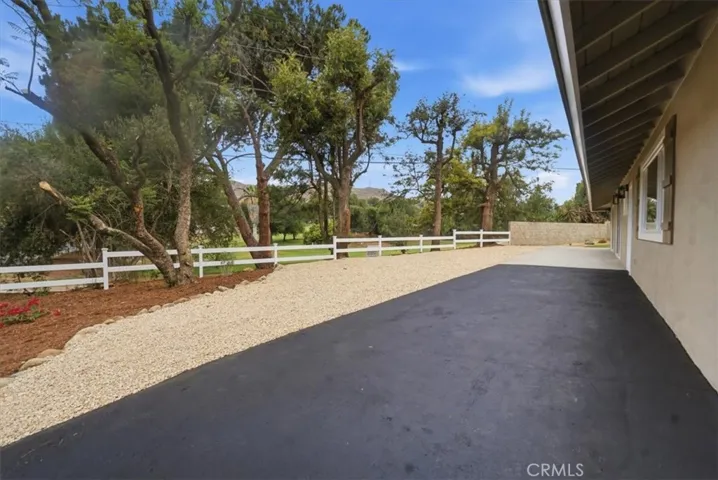 WEST SIDE OF HOME, ADJACENT TO GOLF COURSE