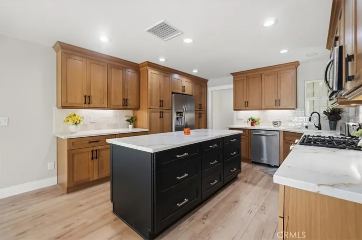 KITCHEN ISLAND WITH STORAGE ON 2 SIDES