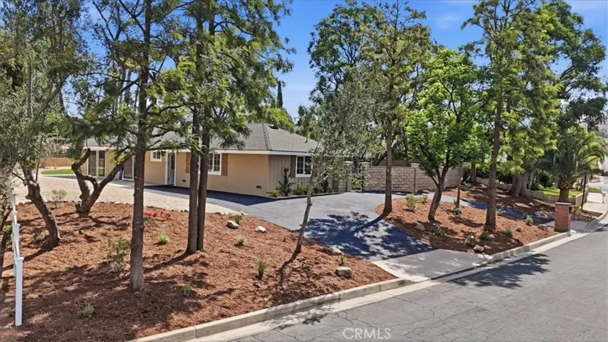WEST-SIDE FRONT VIEW OF HOME