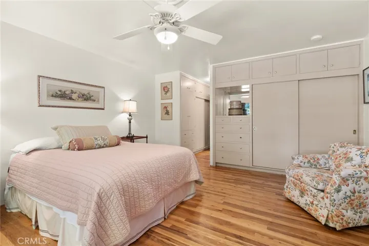  2 closets with storage above. Built-in dressers