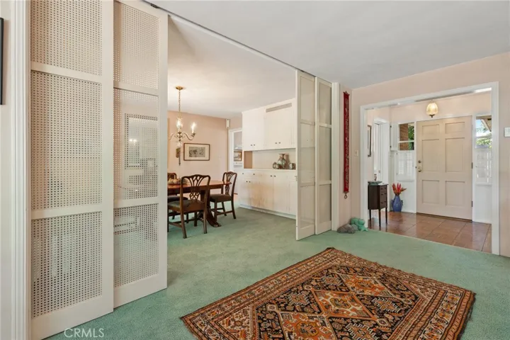 Privacy pull out doors separating dining and living rooms