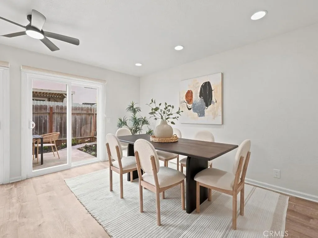 Large kitchen open to living area and back patio.