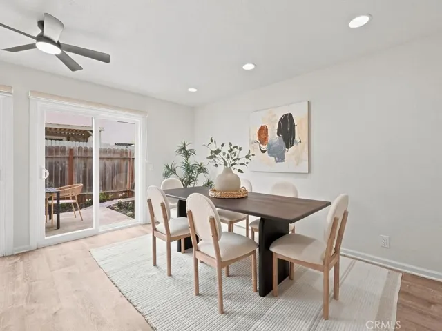 Large kitchen open to living area and back patio.