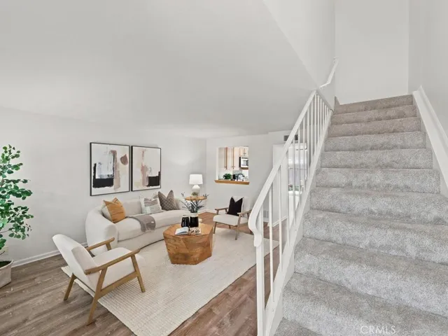 Nice high ceilings and open floor plan with new carpet upstairs.