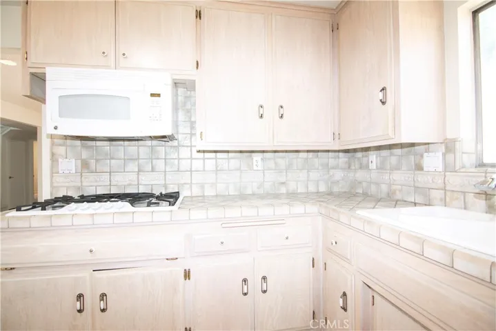 Microwave and gas stovetop