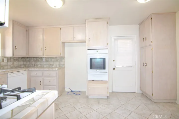 Another door to backyard off kitchen