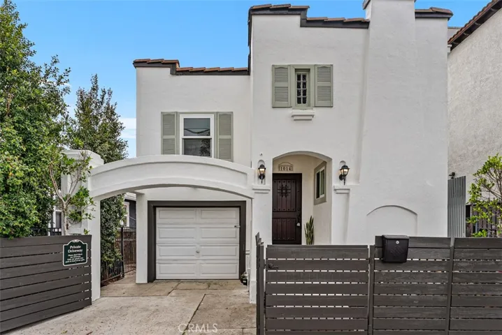 Classic Spanish  architecture creates unforgettable curb appeal from the moment you arrive.