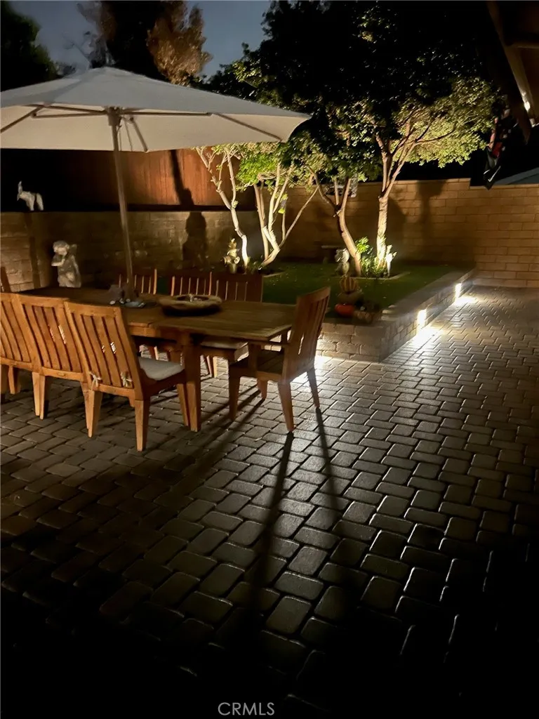 Portion of backyard- lots of lighting