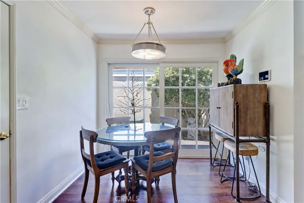 Informal Dining area with sliding door to front courtyard