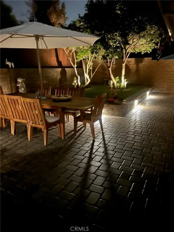 Portion of backyard- lots of lighting