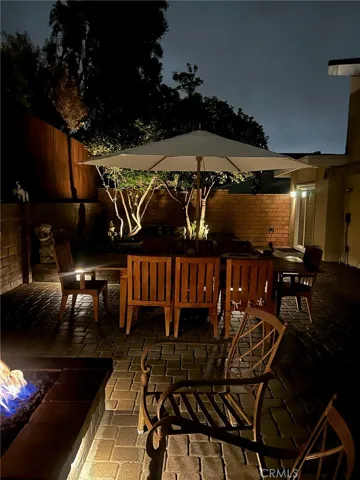 Fire Pit in Back yard with lots of lighting