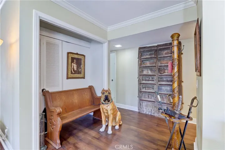 Seating nook area that has a hidden closet to the left