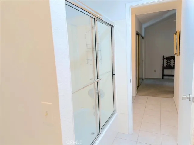 Bath area leads to 2nd bedroom.