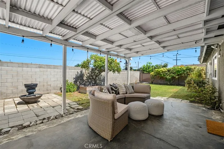 Open and spacious backyard with covered patio
