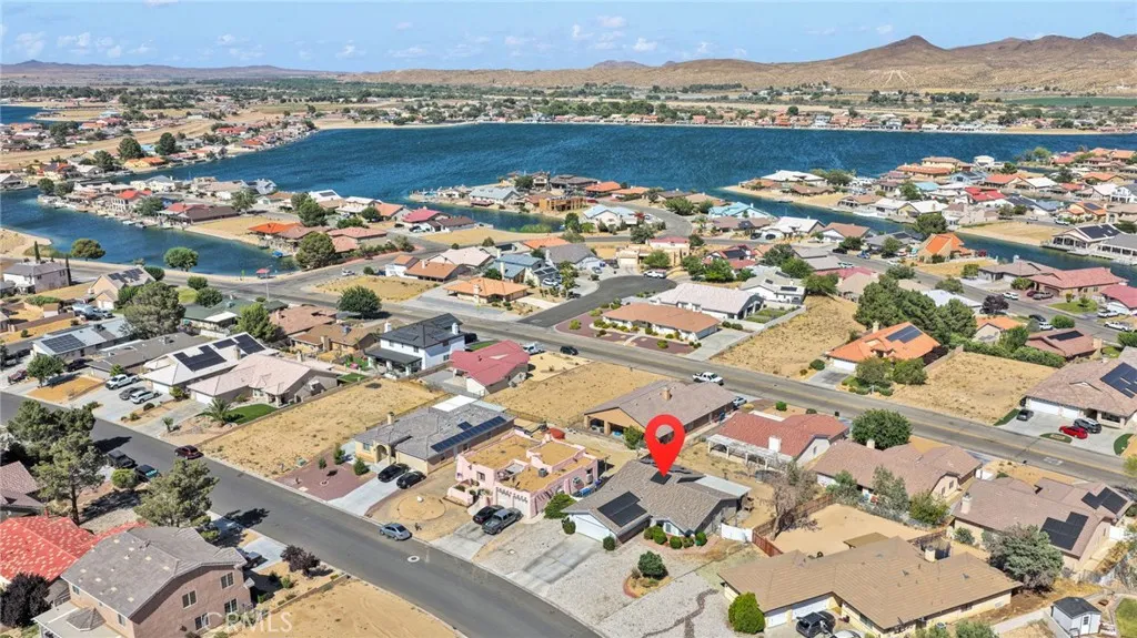 High-altitude aerial overview maps out the spacious community design and showcases the property's quick, direct route to nearby resort assets.