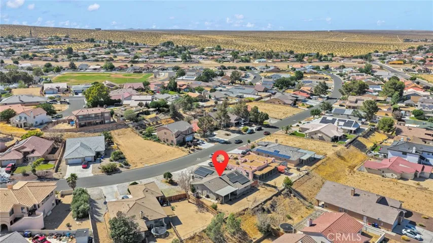 High-altitude aerial overview showing the property position and close proximity to North Lake, offering easy access to the waterfront.