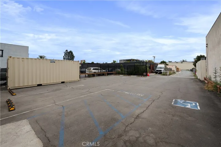7 parking spots in back