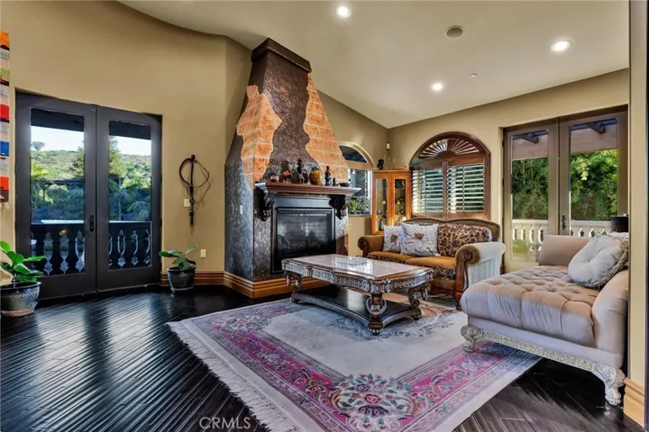 UPSTAIRS FAMILYROOM LEADS TO BALCONIES