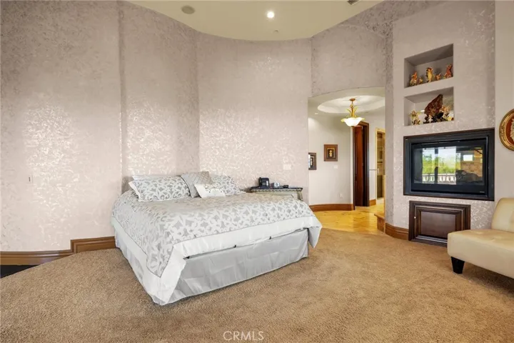 PRIMARY BEDROOM WITH FIREPLACE