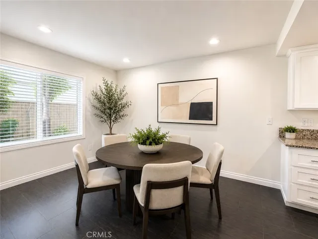 Dining Area with virtual furniture. Furniture and décor have been digitally added for illustrative purposes only and are not included with the property.