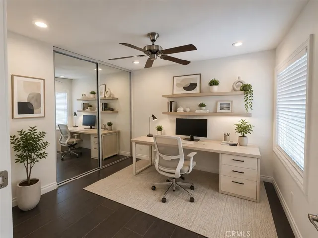 Bedroom #3 with virtual office. furnitureFurniture and décor have been digitally added for illustrative purposes only and are not included with the property.