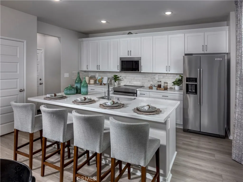 Photo is not of the actual home, but is an inspirational photo of builder’s model home and may depict options, furnishings, and/or decorator features that are not included