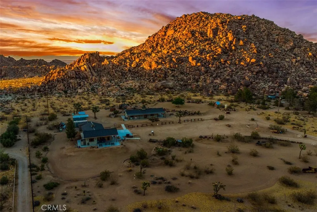 Overlooking the property to the north, with breathtaking views of the adjoining 640 acres of protected government land, offering exceptional privacy and open desert scenery.